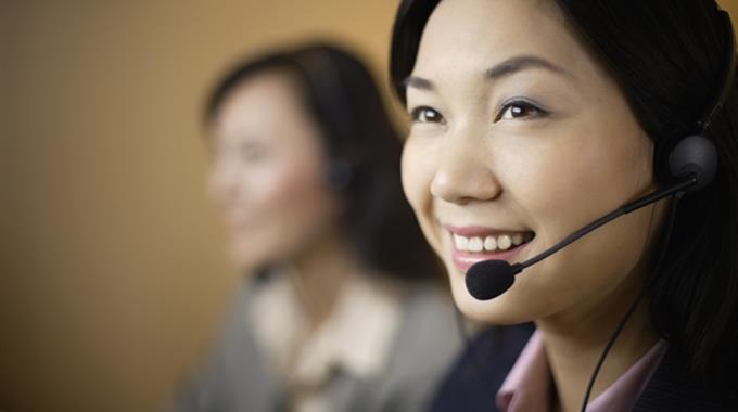 Woman talking on headset